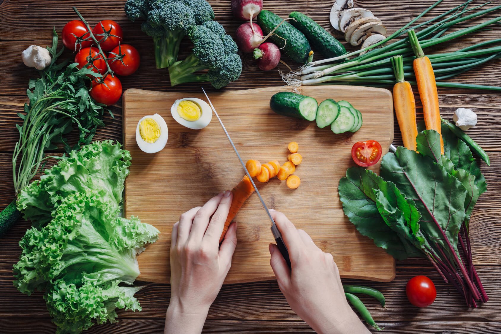 Healthy food and ingredients on rustic wooden background